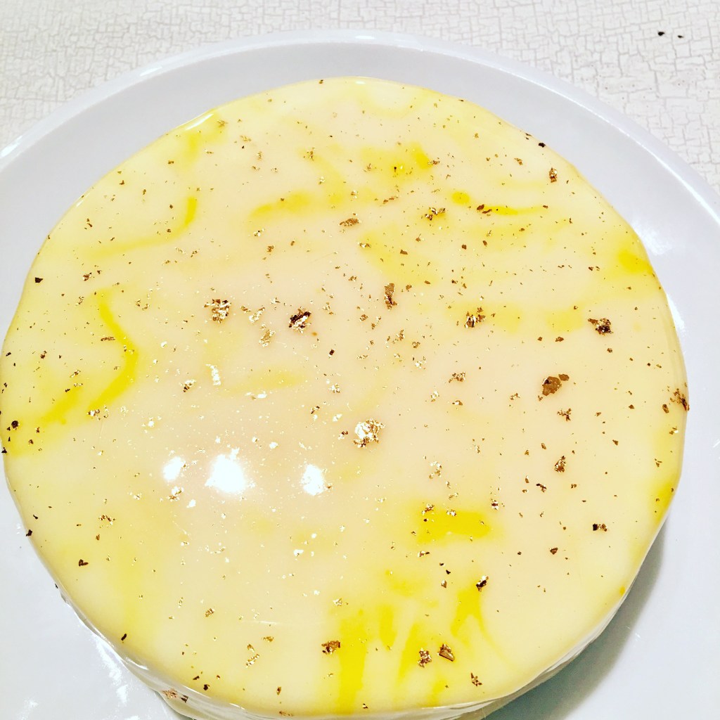 Mirror glazed white Chocolate & Ginger Cheesecake